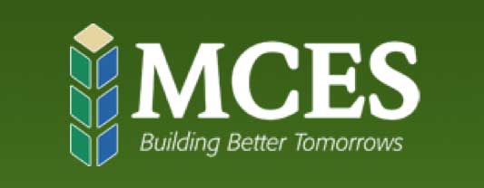 A logo for MCES. Green background with white text. “MCES” in large bold font. Below it in smaller print “Building Better Tomorrows”.