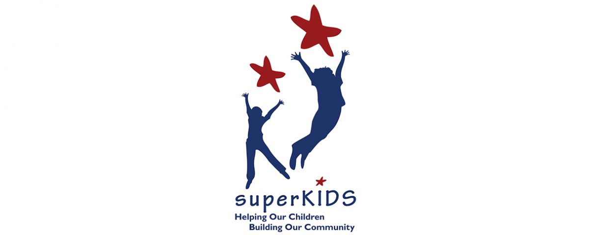 A logo for superKids organization. The organization is a charity dedicated to raising money for abused children. The logo shows two kid silhouette figures paired with red organic stars.