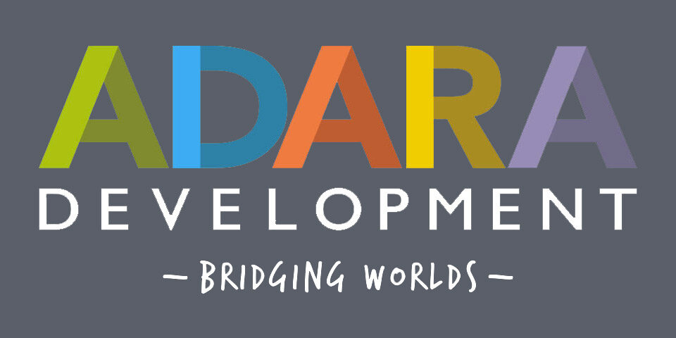 Logo for ADARA Development. ADARA is in a bold font towards the top. Each letter is a different color with two shades for a more unique design. Development is written below in white in all caps. At the bottom in a hand written font is saying “-Bridging Worlds-“.