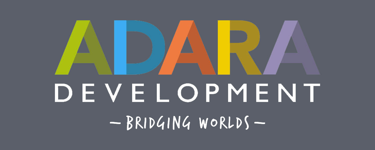 Logo for ADARA Development. ADARA is in a bold font towards the top. Each letter is a different color with two shades for a more unique design. Development is written below in white in all caps. At the bottom in a hand written font is saying “-Bridging Worlds-“.