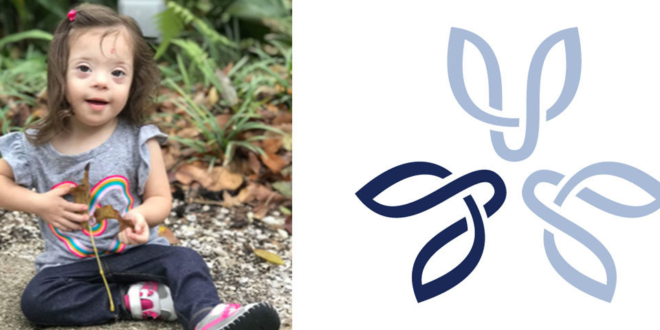 Graphic for Down Syndrome Awareness Day. On the left is an image of a young girl playing with a leaf. On the right is a logo created from an elegant symbol.