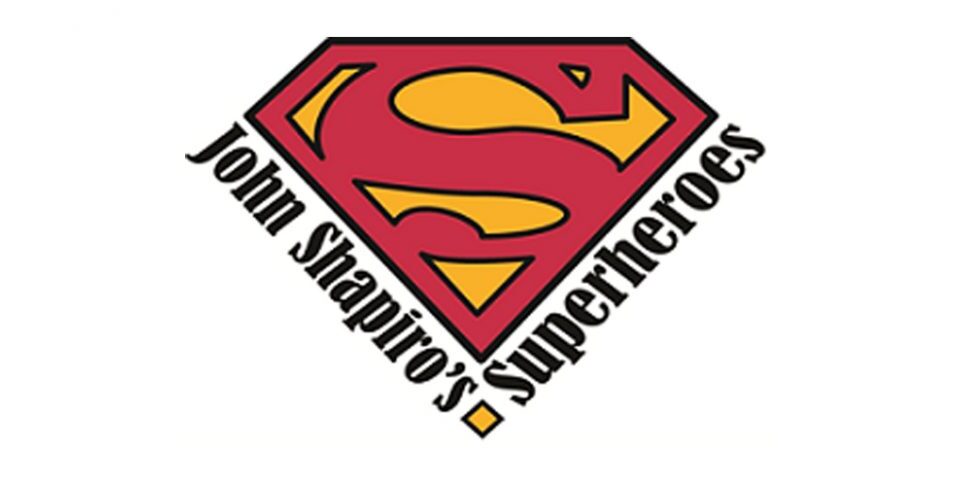 Logo for John Shapiros Super hero’s foundation. Superman logo is found in the center with the organizations name listed below.