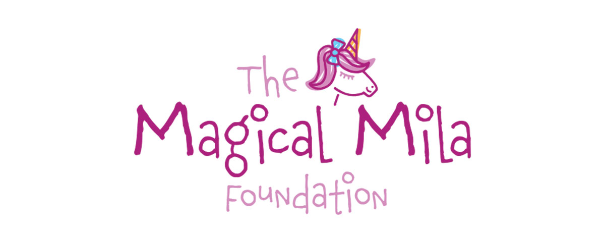 Logo for The Magical Mila Foundation. The text is in a childish hand written font. There is a small illustration of a pink haired unicorn with bow placed towards the top. Logo consist of two different pink colors.