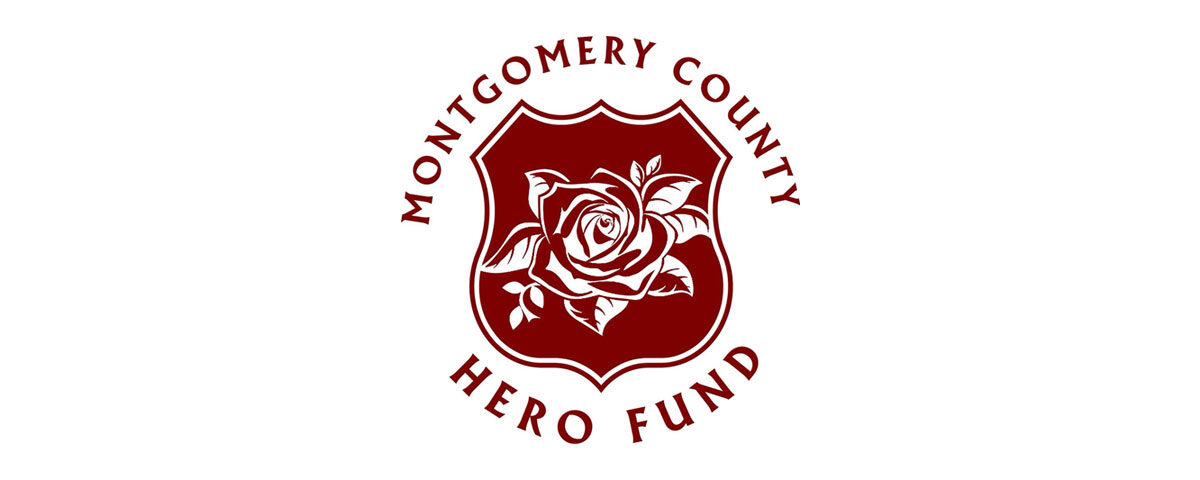 Montgomery County Hero Fund Logo. Design show text in a circle format. In the center sits a maroon shield with a rose design inside.