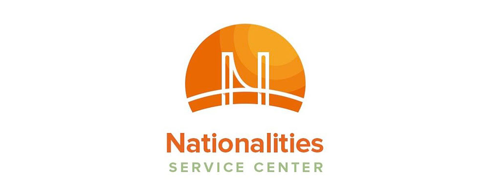 Nationalities Service Center logo. Design has an orange and green color pallet. Circle towards the top that shows a bridge design made with white lines. Name of the company is listed below.