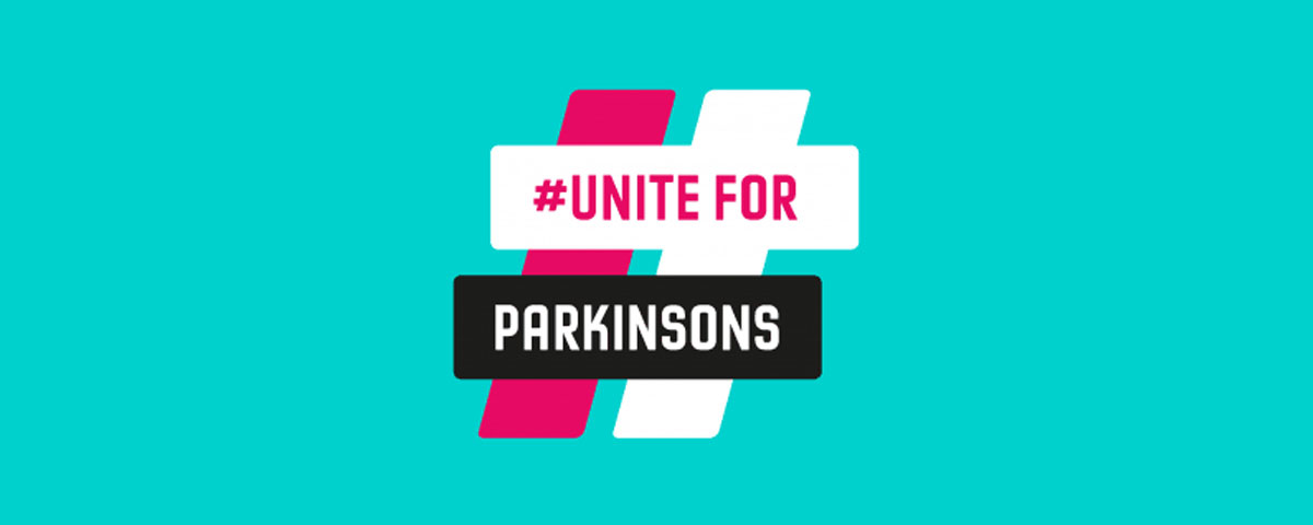 Logo for #unite for Parkinson’s. The graphic shows a number sign made up of different color stripes. Two pointing vertically, one on left is pink and on the right white. The two stripes pointing horizontal contain the text for the logo. The top white stripe contains the hashtag “#UNITE FOR” in pink text. The bottom black stripe contains the word “Parkinson’s” in white.