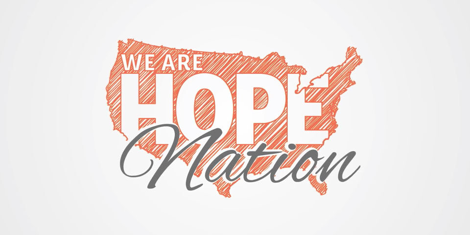 We Are Hope Nation Logo. In a hand-drawn style, a silhouette of the U.S.A continent is show in orange. Inside the continent “WE ARE HOPE” is spelled out. Towards the bottom in a script font “Nation is written out.”