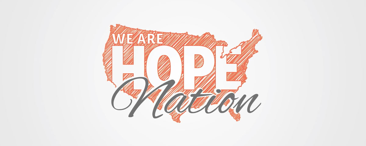 We Are Hope Nation Logo. In a hand-drawn style, a silhouette of the U.S.A continent is show in orange. Inside the continent “WE ARE HOPE” is spelled out. Towards the bottom in a script font “Nation is written out.”